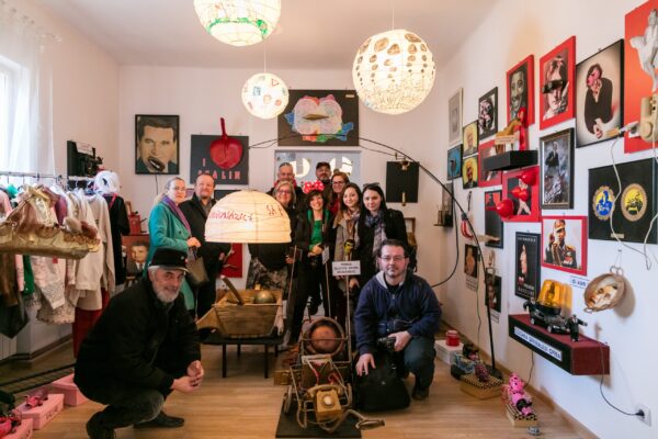 Robert J. Wierzbicki and other guests visiting Ion Barbu’s studio in Baru Mare, Romania; Ion Barbu is crouching on the left, 2017